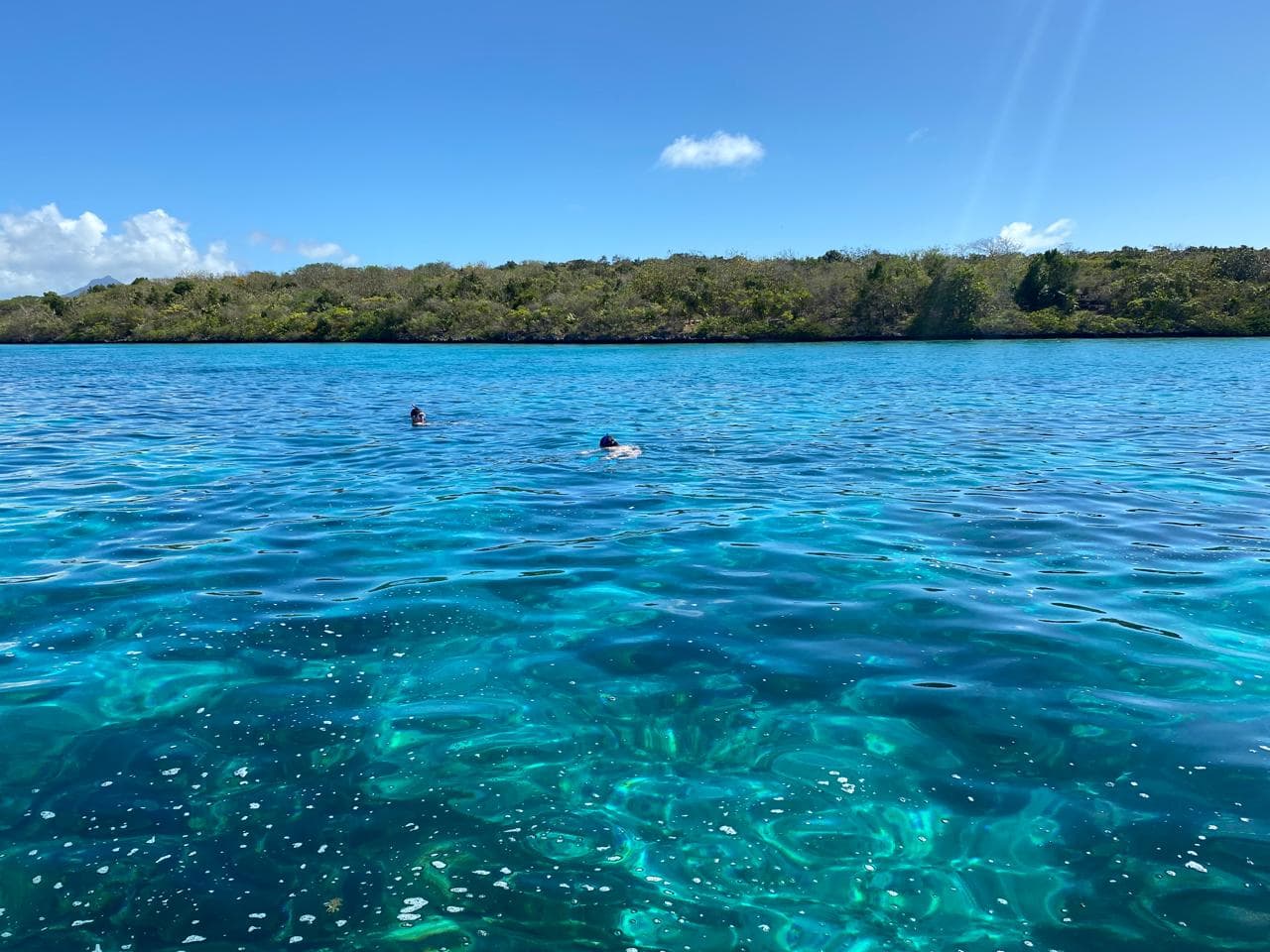Swimming in the pristine blue lagoon of Mauritius