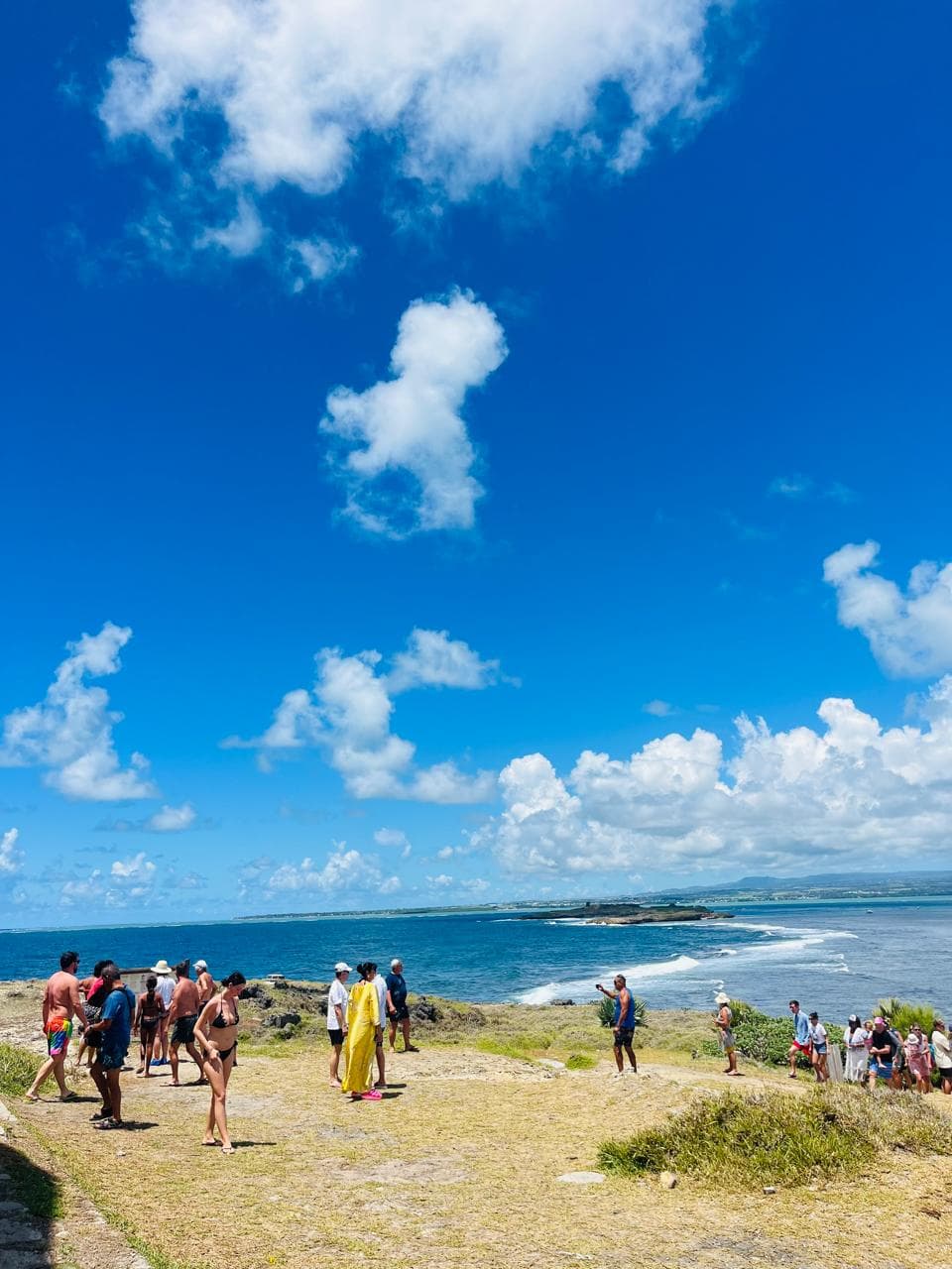 Tourists enjoying island viewpoint in Mauritius